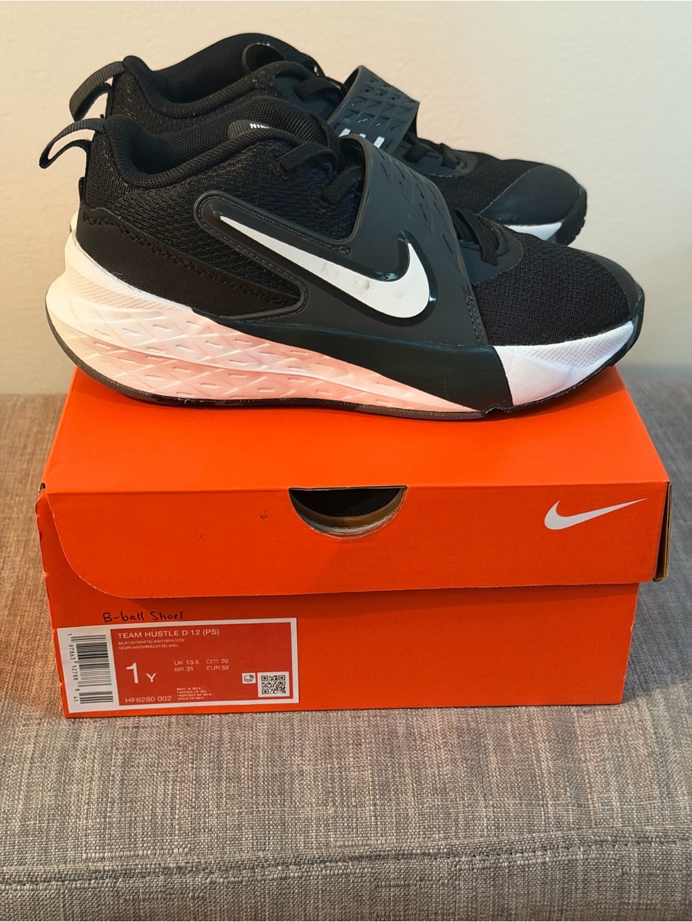Nike Kids Black and White Team Hustle Basketball Sneakers